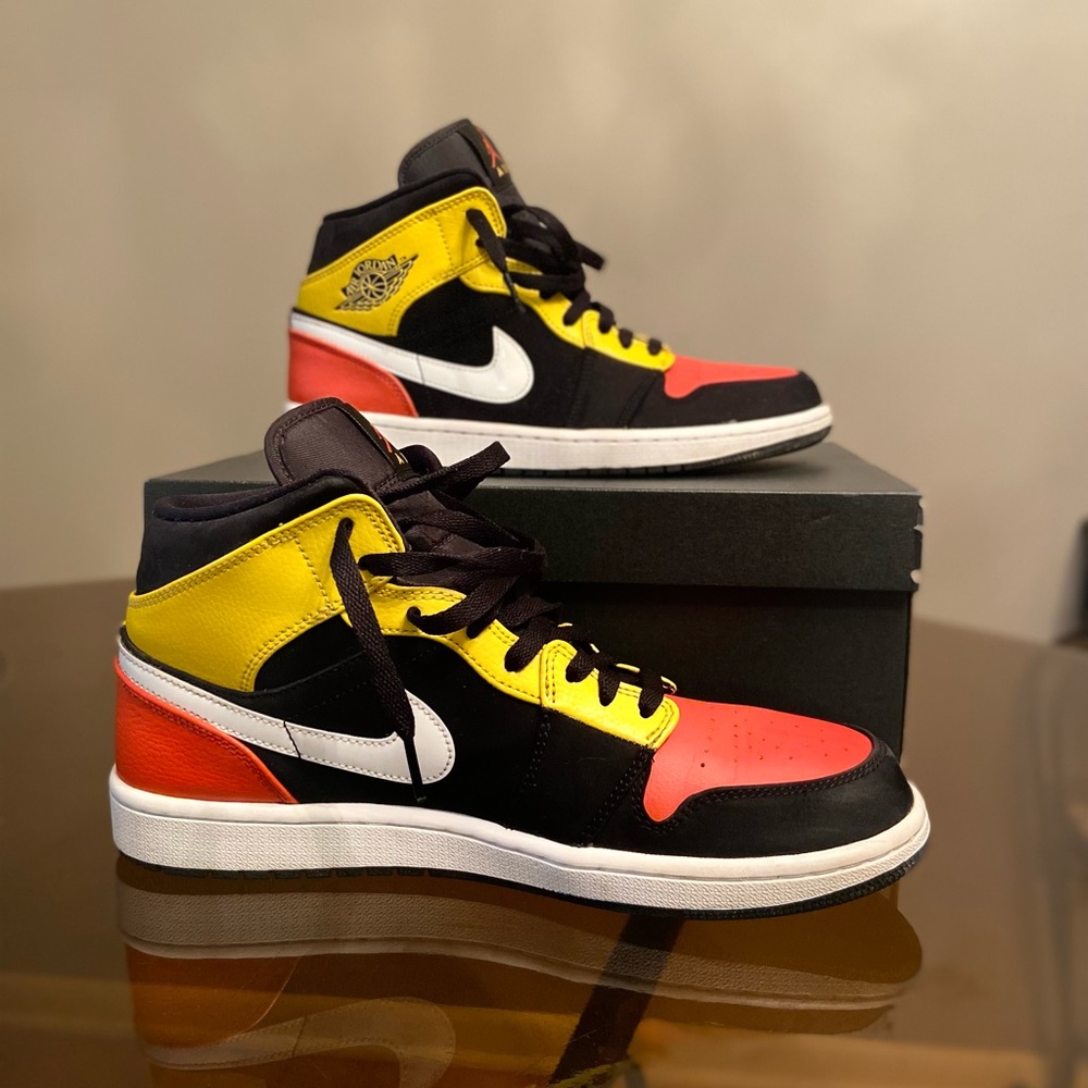 Jordan 1 Mid Black Amarillo Orange